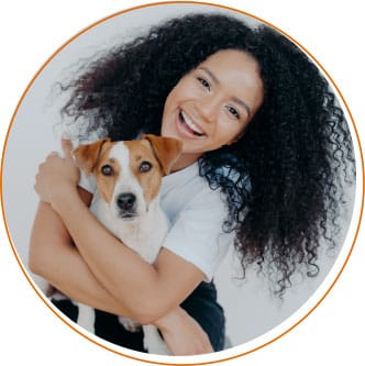 Happy woman with a small dog